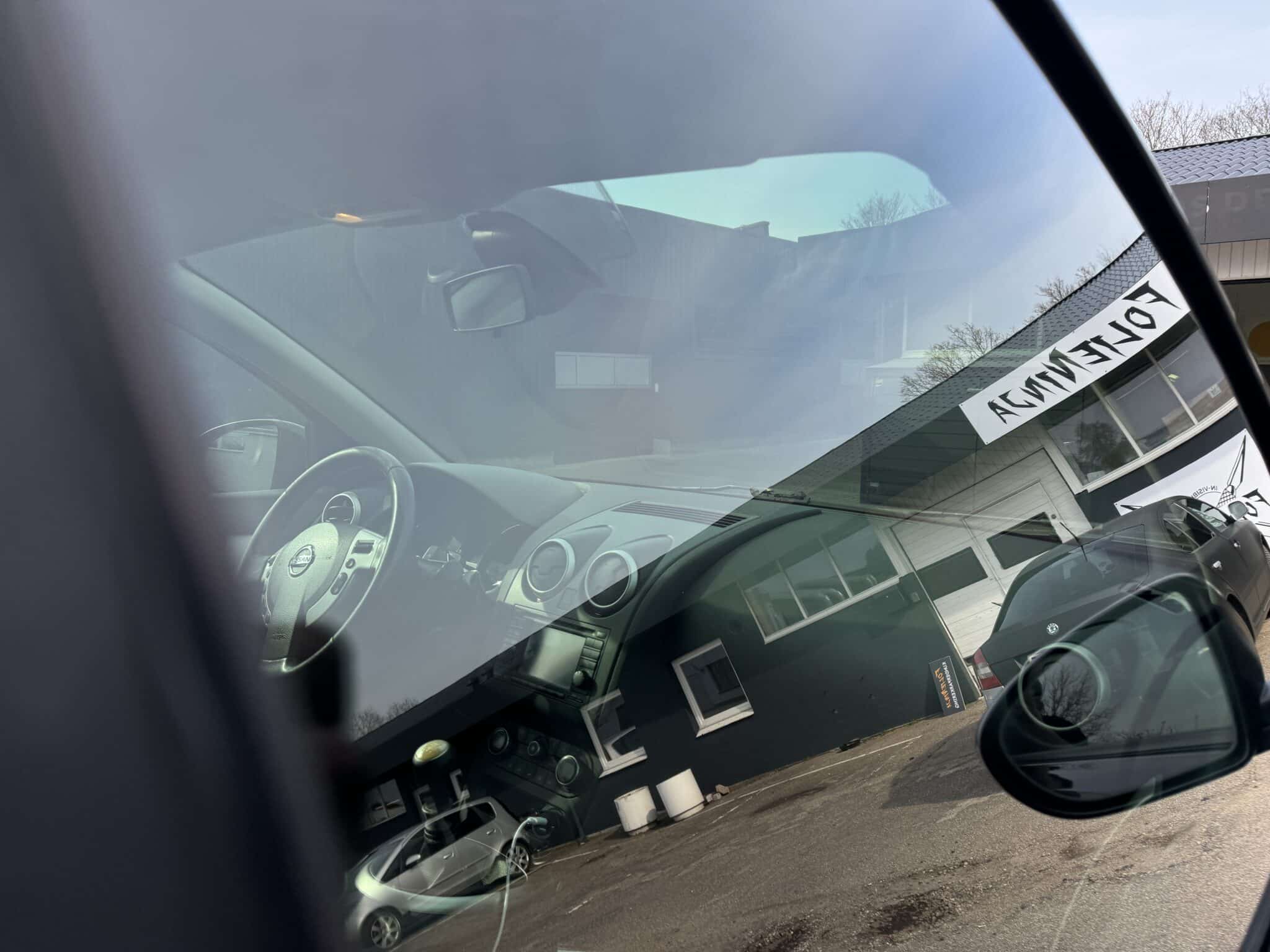 Solfilm monteret på bygningsglas